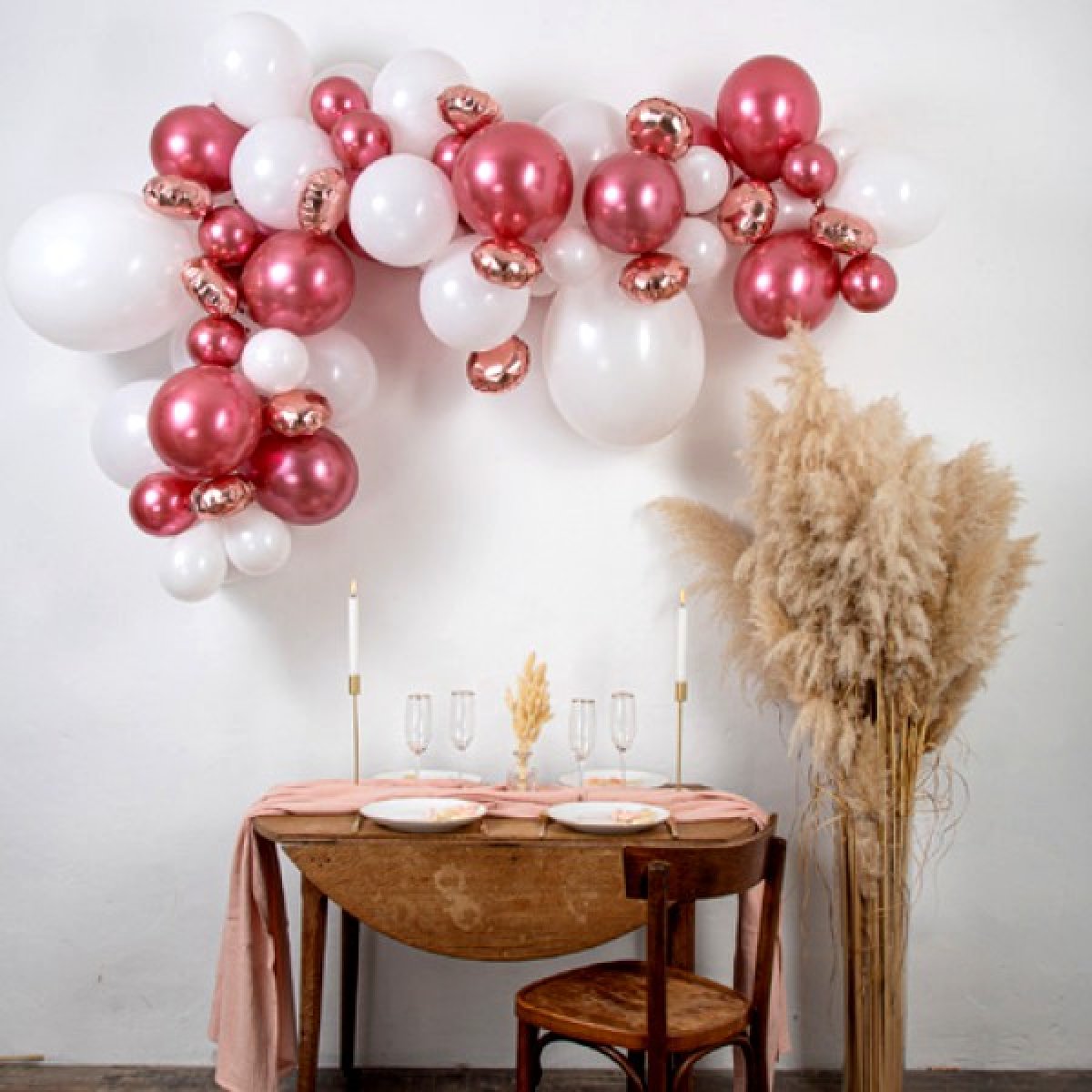 Arche de 70 ballons rose gold et blancs