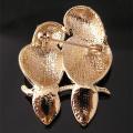 Broche femme - Oiseaux métal rhodié doré - cristal clair