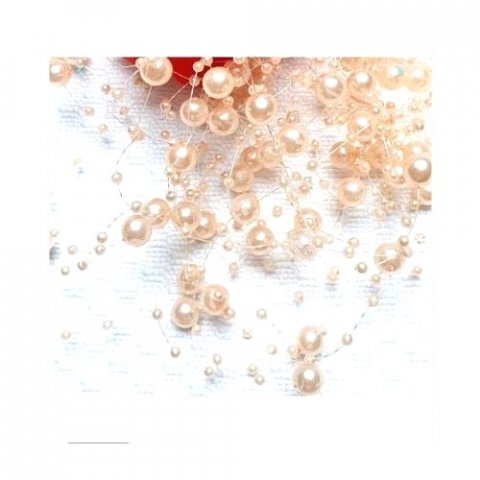 Guirlande de perles saumon x 130 cm